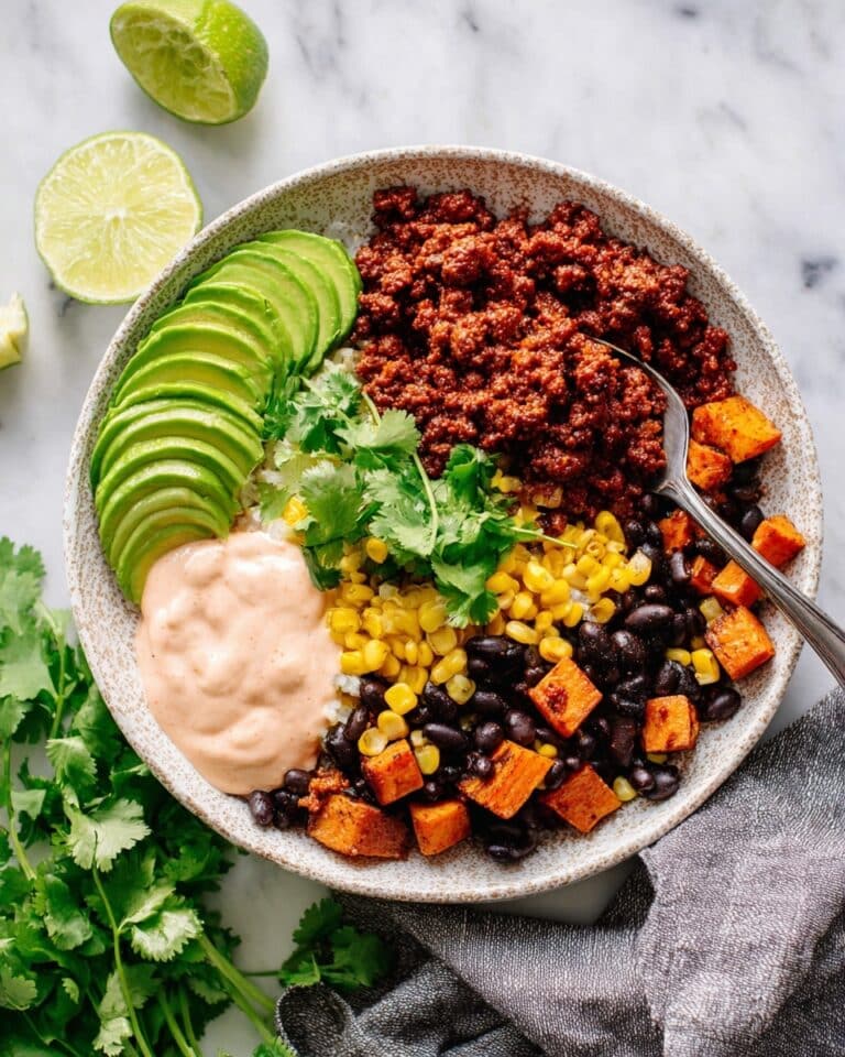 Ground Beef Taco Bowl with Roasted Sweet Potatoes and Spicy Lime Sauce Recipe